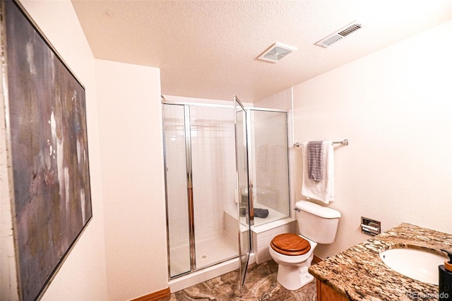 588 Stafford Cir, Castle Rock, CO 80104 - full bathroom featuring a shower stall, vanity, and a textured ceiling