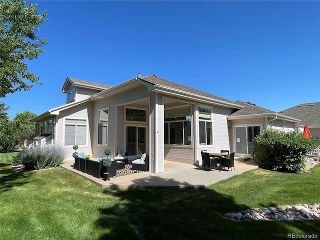 588 Stafford Cir, Castle Rock, CO 80104 - back of property with a patio, a yard, and outdoor lounge area
