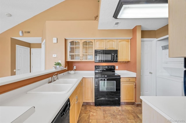 13782 E Lehigh Ave Unit H, Aurora, CO 80014 - kitchen featuring black appliances, light brown cabinets, glass insert cabinets, and light countertops