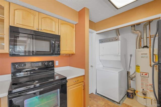 13782 E Lehigh Ave Unit H, Aurora, CO 80014 - kitchen with black appliances, stacked washer and clothes dryer, water heater, light brown cabinetry, and light countertops