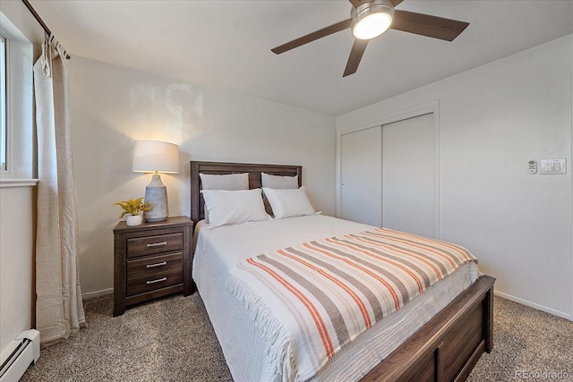 bedroom featuring a baseboard radiator, a closet, ceiling fan, and carpet