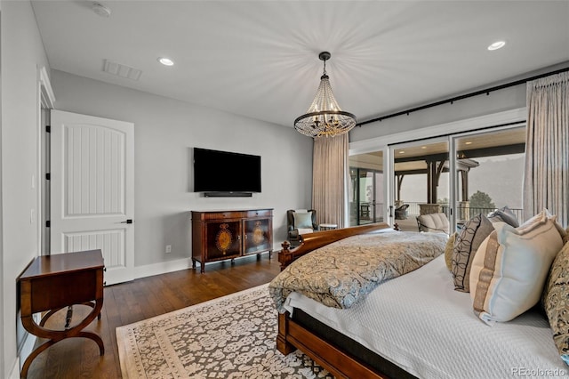 bedroom featuring visible vents, wood-type flooring, recessed lighting, and a chandelier