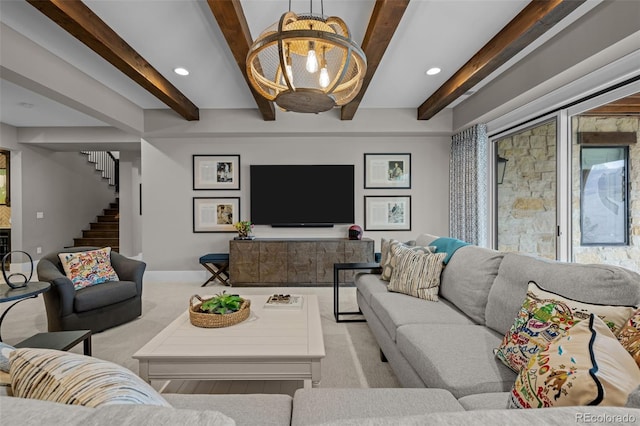 carpeted living room with stairs, recessed lighting, baseboards, and an inviting chandelier