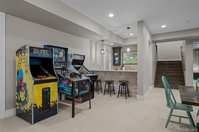playroom with carpet floors, baseboards, indoor bar, and recessed lighting