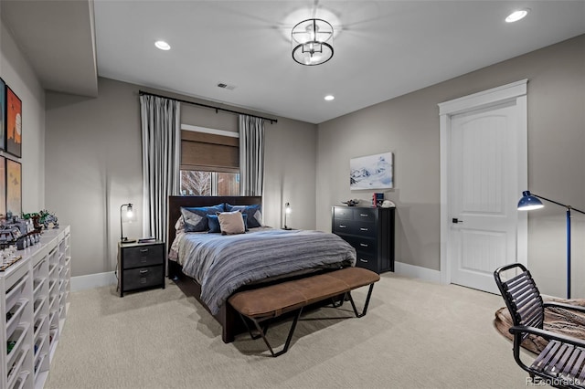 bedroom featuring light colored carpet, recessed lighting, baseboards, and visible vents