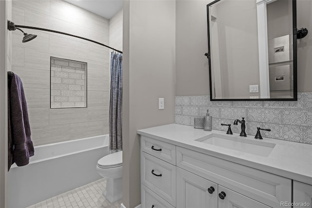 full bath featuring vanity, shower / tub combo with curtain, decorative backsplash, tile patterned flooring, and toilet
