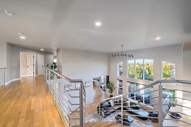 stairway featuring hardwood / wood-style floors