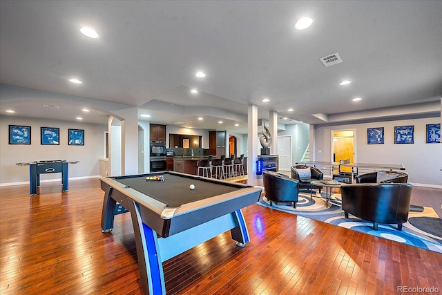 game room featuring sink, hardwood / wood-style flooring, and billiards