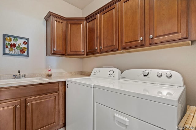 10064 Bluffmont Ct, Lone Tree, CO 80124 - washroom with washing machine and dryer and cabinet space