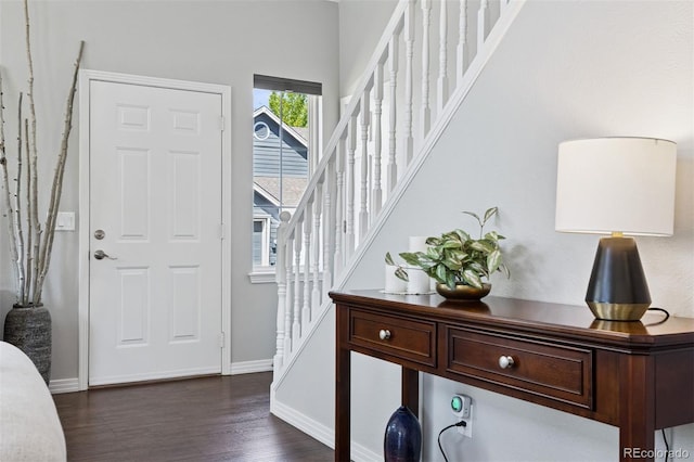 4976 S Nelson St Unit A, Littleton, CO 80127 - foyer entrance with stairway, dark wood finished floors, and baseboards