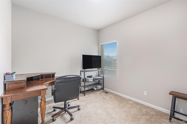 view of carpeted office space