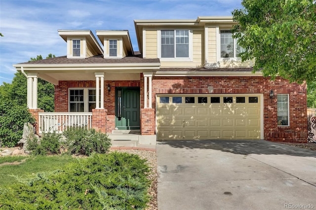 3109 S Jebel Way, Aurora, CO 80013 - view of front facade featuring concrete driveway, covered porch, brick siding, and an attached garage