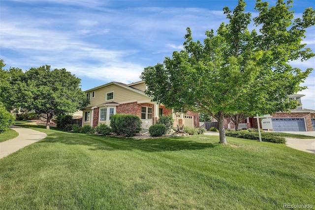 3109 S Jebel Way, Aurora, CO 80013 - obstructed view of property featuring brick siding, a front lawn, and driveway