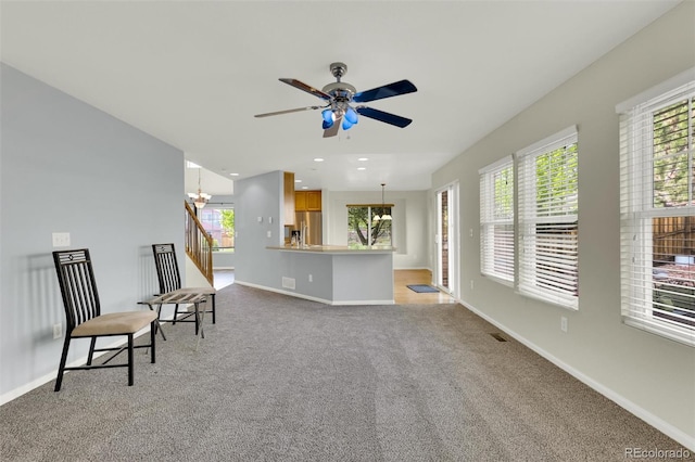 3109 S Jebel Way, Aurora, CO 80013 - living area featuring ceiling fan, plenty of natural light, baseboards, light colored carpet, and recessed lighting