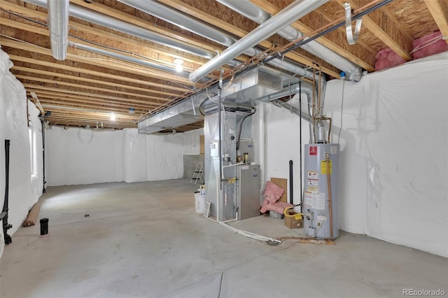 3109 S Jebel Way, Aurora, CO 80013 - unfinished below grade area featuring water heater and heating unit