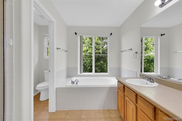 3109 S Jebel Way, Aurora, CO 80013 - full bathroom with toilet, vanity, tile patterned floors, a garden tub, and a shower