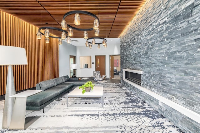 unfurnished living room with a towering ceiling