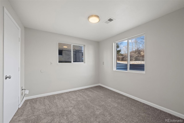 view of carpeted spare room