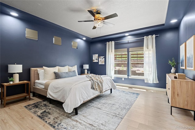 1815 Avery Way, Castle Rock, CO 80109 - bedroom featuring wood finished floors, ceiling fan, and recessed lighting
