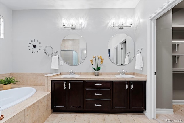 1815 Avery Way, Castle Rock, CO 80109 - full bathroom with a bath, double vanity, tiled shower, and tile patterned flooring