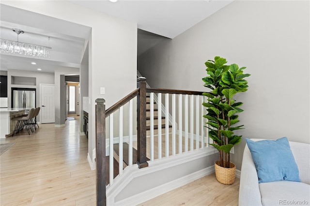 1815 Avery Way, Castle Rock, CO 80109 - stairs featuring wood finished floors and recessed lighting