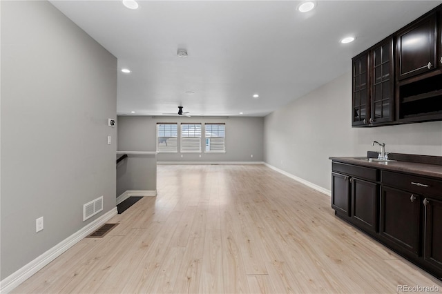 1815 Avery Way, Castle Rock, CO 80109 - unfurnished living room with light wood finished floors, recessed lighting, and a ceiling fan