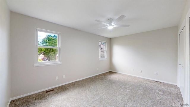 1006 Homestake Dr Unit 1D, Golden, CO 80401 - carpeted spare room featuring ceiling fan and healthy amount of natural light
