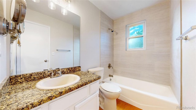 1006 Homestake Dr Unit 1D, Golden, CO 80401 - bathroom with vanity, washtub / shower combination, and wood finished floors