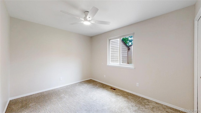 1006 Homestake Dr Unit 1D, Golden, CO 80401 - carpeted spare room with baseboards and ceiling fan