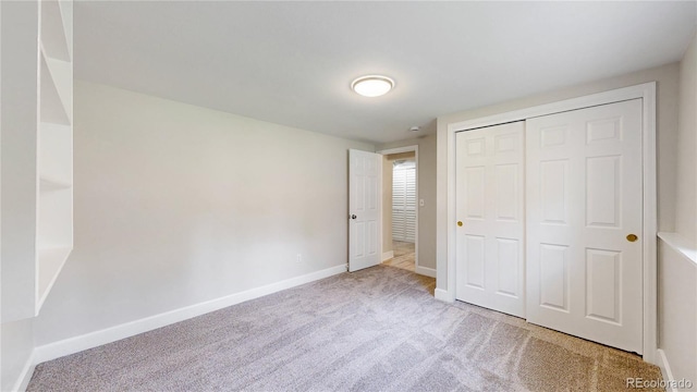 1006 Homestake Dr Unit 1D, Golden, CO 80401 - unfurnished bedroom with carpet flooring and a closet