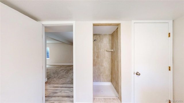 1006 Homestake Dr Unit 1D, Golden, CO 80401 - full bathroom featuring tiled shower and baseboards