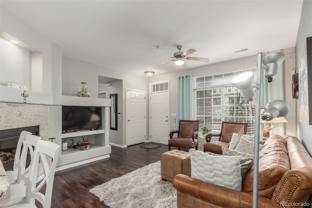 457 Black Feather Loop Unit 702, Castle Rock, CO 80104 - living area with wood finished floors and a ceiling fan