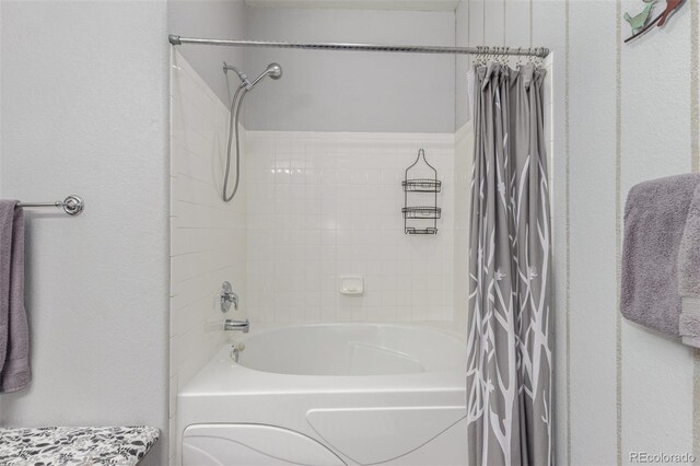 457 Black Feather Loop Unit 702, Castle Rock, CO 80104 - full bath featuring shower / bathtub combination with curtain