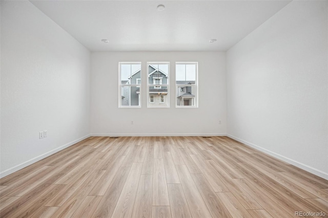 2102 Wagon Wheel Aly, Brighton, CO 80601 - empty room with light wood-style floors and baseboards
