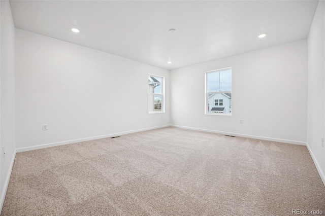 2102 Wagon Wheel Aly, Brighton, CO 80601 - carpeted spare room with recessed lighting