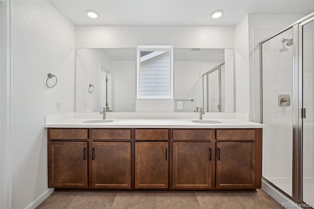 2102 Wagon Wheel Aly, Brighton, CO 80601 - bathroom with double vanity and a stall shower