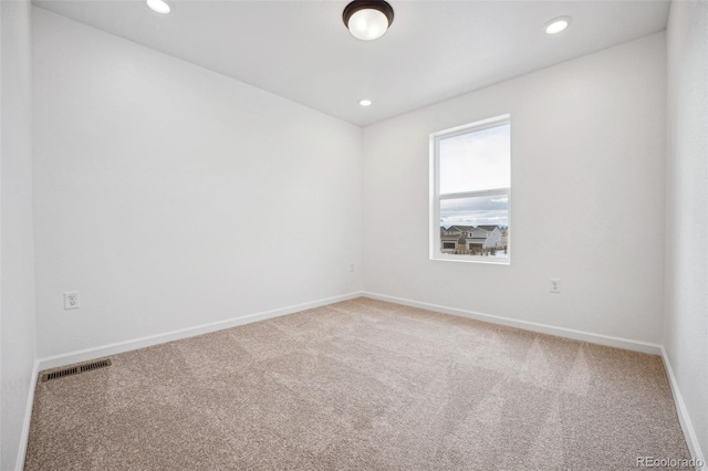 2102 Wagon Wheel Aly, Brighton, CO 80601 - carpeted empty room with recessed lighting