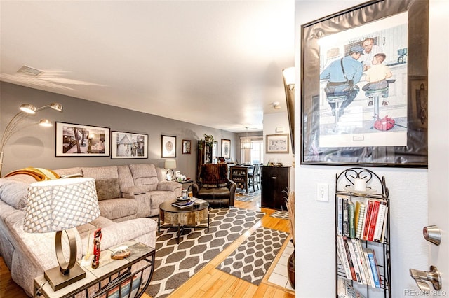 1372 S Cathay Ct Unit 104, Aurora, CO 80017 - living area featuring wood finished floors
