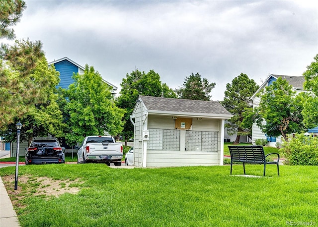 1372 S Cathay Ct Unit 104, Aurora, CO 80017 - exterior space with mail area and a lawn