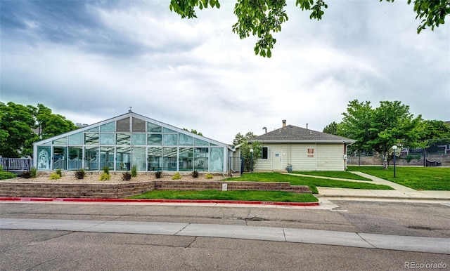 1372 S Cathay Ct Unit 104, Aurora, CO 80017 - view of front of property with a front lawn