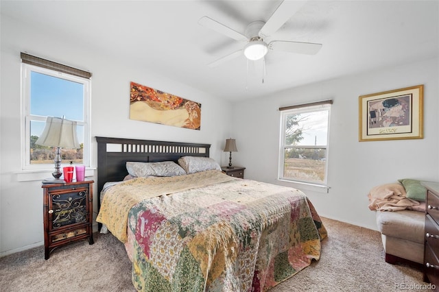 bedroom featuring ceiling fan and carpet floors