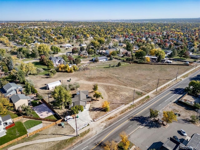 birds eye view of property with a residential view