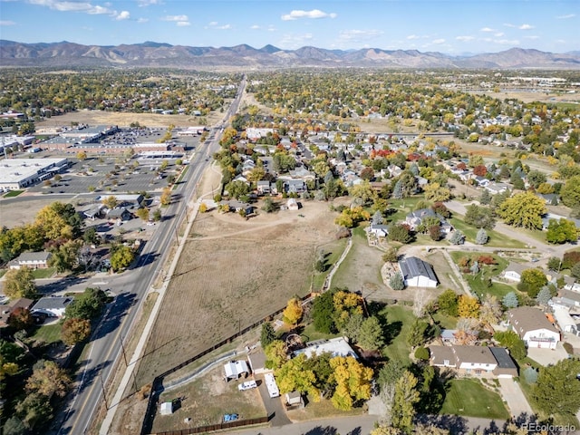 drone / aerial view with a residential view and a mountain view