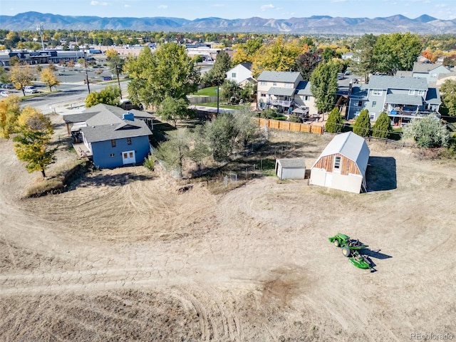 bird's eye view with a residential view and a mountain view