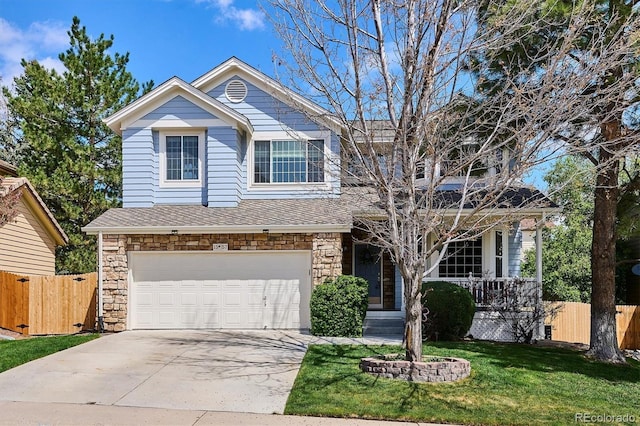 view of front of home with covered porch, an attached garage, fence, and driveway