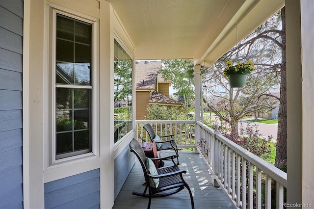 balcony featuring a porch