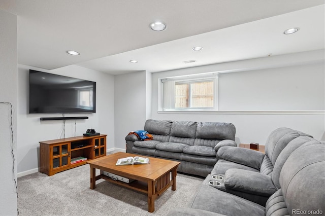 living room with recessed lighting, baseboards, visible vents, and light carpet
