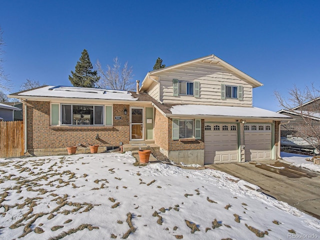 view of front of property featuring a garage