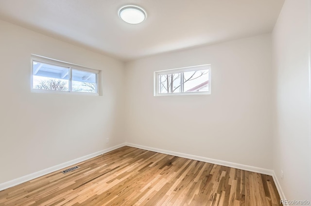 empty room featuring light hardwood / wood-style floors