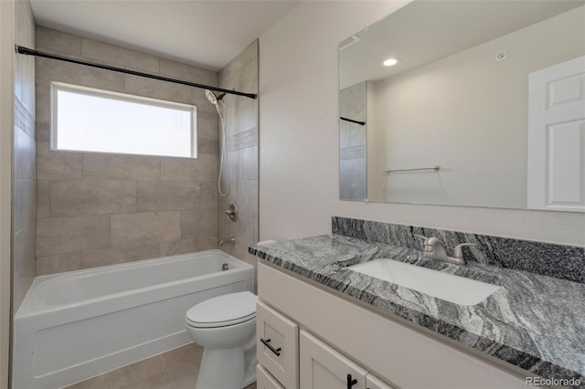 full bath featuring toilet, shower / bath combination, tile patterned flooring, and vanity